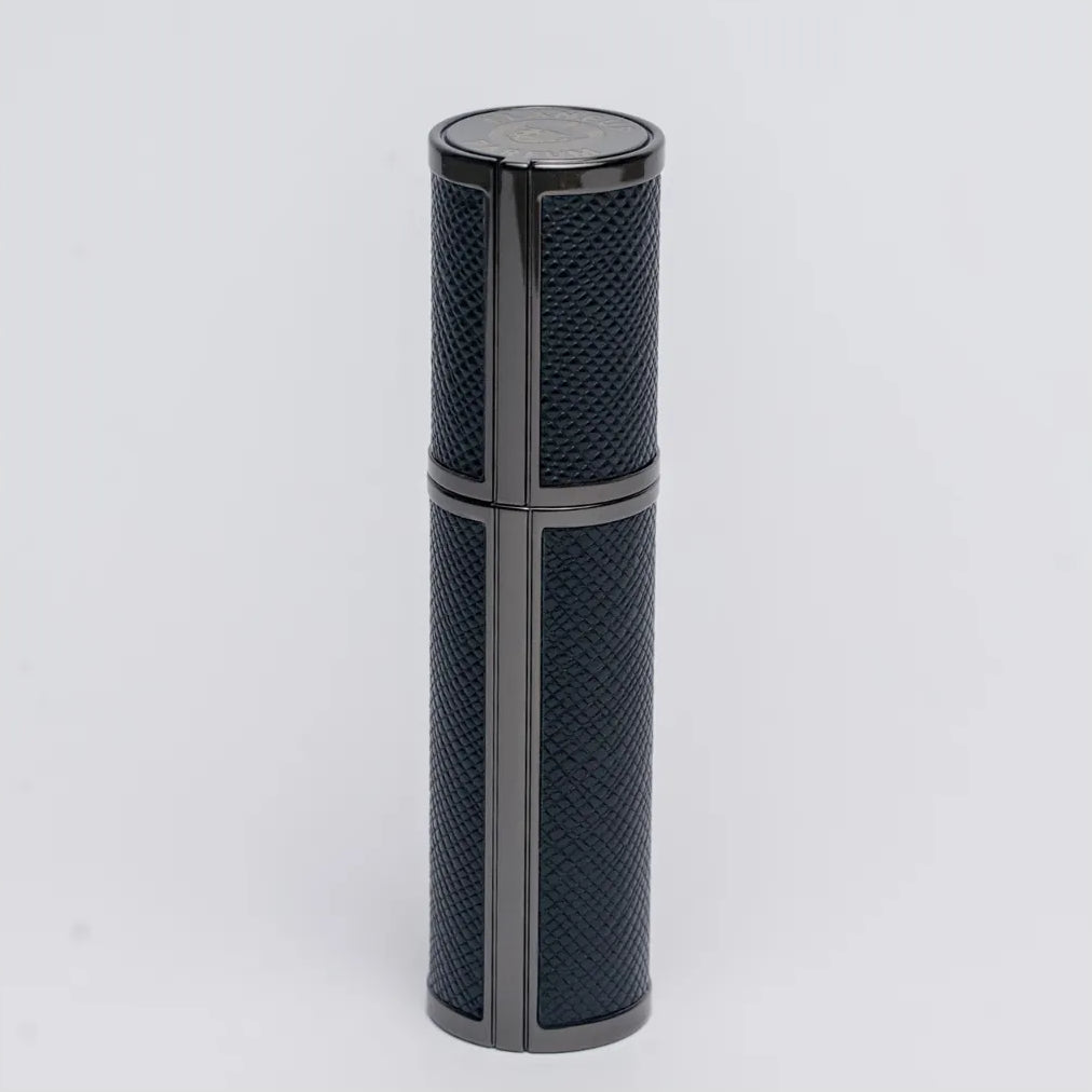Flâneur Parfum leather travel perfume atomizer 5ml closed showing full leather wrap and aluminium detail