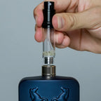 Flâneur Parfum atomizer PCTG inner chamber being filled with perfume using bottom fill mechanism